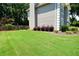 Well-maintained lawn with fresh landscaping at 340 Channings Lake Dr, Lawrenceville, GA 30043