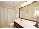 Bathroom featuring a vanity, large mirror and shower with curtain at 340 Channings Lake Dr, Lawrenceville, GA 30043