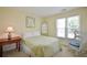 Cozy bedroom with a rocking chair, neutral walls, and natural light at 340 Channings Lake Dr, Lawrenceville, GA 30043