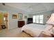 Spacious bedroom with ceiling fan, and natural light from windows at 340 Channings Lake Dr, Lawrenceville, GA 30043