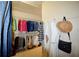 Walk-in closet with wire shelving and hanging clothes at 340 Channings Lake Dr, Lawrenceville, GA 30043