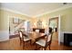 Elegant dining room offers hardwood floors and view to living spaces at 340 Channings Lake Dr, Lawrenceville, GA 30043