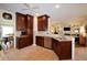 Open concept kitchen with stainless steel appliances, granite countertops, and breakfast bar at 340 Channings Lake Dr, Lawrenceville, GA 30043