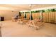 Picnic area with wooden tables under a covered structure surrounded by foliage at 340 Channings Lake Dr, Lawrenceville, GA 30043