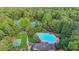 Aerial view of the community amenities including a swimming pool, tennis courts, and a basketball court at 350 River Walk Ter, Johns Creek, GA 30024