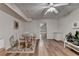 Versatile basement space with wood laminate flooring, dining area, and additional storage at 350 River Walk Ter, Johns Creek, GA 30024
