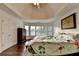 Bright and spacious bedroom with tray ceilings, hardwood floors, and natural lighting at 350 River Walk Ter, Johns Creek, GA 30024