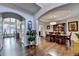 Elegant dining room featuring hardwood floors and access to the foyer at 350 River Walk Ter, Johns Creek, GA 30024