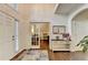 Welcoming foyer featuring hardwood floors, a console table, and natural light at 350 River Walk Ter, Johns Creek, GA 30024