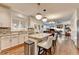 Modern kitchen with granite countertops, stainless steel appliances, and eat-in island at 350 River Walk Ter, Johns Creek, GA 30024