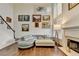 Spacious living room with high ceilings, fireplace, hardwood floors, and ample natural light at 350 River Walk Ter, Johns Creek, GA 30024