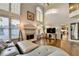Spacious living room with hardwood floors, fireplace, and lots of natural light at 350 River Walk Ter, Johns Creek, GA 30024