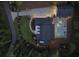Overhead view of a beautiful home with a pool, outdoor kitchen, long driveway, and manicured lawn at 504 Trinity Church Rd, Canton, GA 30115