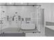 Luxurious bathroom with a large glass-enclosed shower, soaking tub, and sleek fixtures at 504 Trinity Church Rd, Canton, GA 30115
