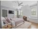 Charming bedroom with built in desk and soft pink accents at 504 Trinity Church Rd, Canton, GA 30115