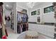 Well-organized walk-in closet with custom shelving and storage for clothing and accessories at 504 Trinity Church Rd, Canton, GA 30115