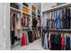 Extensive walk-in closet with custom organization for clothing, shoes, and accessories at 504 Trinity Church Rd, Canton, GA 30115