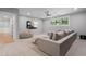 Cozy living room with a large sectional sofa and flat screen TV at 504 Trinity Church Rd, Canton, GA 30115