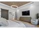 Elegant main bedroom featuring a modern ceiling light, hardwood floors, and tranquil color palette at 504 Trinity Church Rd, Canton, GA 30115
