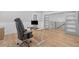 Modern office space featuring a standing desk and comfortable executive chair at 504 Trinity Church Rd, Canton, GA 30115