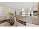Bright kitchen features an island with seating, seamlessly connecting to living space at 118 Chelsea Dr, Decatur, GA 30030