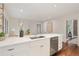 Bright kitchen featuring white cabinets and marble countertops at 118 Chelsea Dr, Decatur, GA 30030