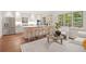 Stylish kitchen with stainless appliances, island, and bar stools at 118 Chelsea Dr, Decatur, GA 30030