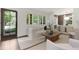 Bright and airy living room featuring a comfortable couch and natural light at 118 Chelsea Dr, Decatur, GA 30030