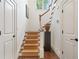 Staircase with carpeted steps and white railing at 118 Chelsea Dr, Decatur, GA 30030