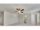 Spacious bedroom features neutral walls, plush carpet, ceiling fan, and adjoins the ensuite bathroom at 320 Pebblestone Ln, Canton, GA 30115