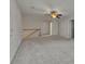 Spacious upper level bonus room with carpet and staircase at 320 Pebblestone Ln, Canton, GA 30115