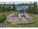 Community playground features slides and climbing structure with shaded canopies and bench seating at 320 Pebblestone Ln, Canton, GA 30115
