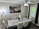 The dining area has a neutral color scheme and a window with great lighting at 460 Heathrow Way, Stone Mountain, GA 30087