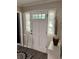 Welcoming front entryway featuring a stylish white door and decorative touches at 460 Heathrow Way, Stone Mountain, GA 30087