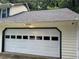 Spacious two-car garage providing ample parking and storage space at 460 Heathrow Way, Stone Mountain, GA 30087