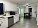 Eat-in kitchen with a table, gray floors and stainless steel appliances at 460 Heathrow Way, Stone Mountain, GA 30087