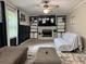Inviting living room with a fireplace, built-in shelves and comfortable seating at 460 Heathrow Way, Stone Mountain, GA 30087