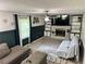 Cozy living room featuring a brick fireplace and built-in shelving at 460 Heathrow Way, Stone Mountain, GA 30087