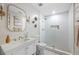 Bathroom featuring a vanity with marble countertops, frameless shower, and modern fixtures at 113 Stargaze Rdg, Canton, GA 30114