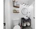 Stylish bathroom with modern fixtures, black and white tiling, and vanity sink at 113 Stargaze Rdg, Canton, GA 30114