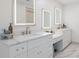 Bright bathroom featuring dual sinks, quartz countertop, white cabinets, and modern fixtures at 113 Stargaze Rdg, Canton, GA 30114