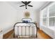 Cozy bedroom with natural light, neutral tones, and hardwood flooring at 113 Stargaze Rdg, Canton, GA 30114