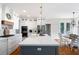 Beautiful kitchen with a large island, stainless steel appliances, and a double oven at 113 Stargaze Rdg, Canton, GA 30114