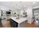 Bright, open kitchen featuring a large island, hardwood floors and stainless appliances at 113 Stargaze Rdg, Canton, GA 30114