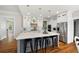 Spacious kitchen with an island and bar seating, stainless steel appliances, and ample cabinet space at 113 Stargaze Rdg, Canton, GA 30114