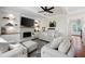 Inviting living room with a fireplace, built-in shelving, and soft, neutral tones at 113 Stargaze Rdg, Canton, GA 30114