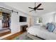 Main bedroom with large walk-in closet and tray ceiling with fan at 113 Stargaze Rdg, Canton, GA 30114