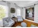Sitting area in main bedroom with sliding barn door access to walk-in closet at 113 Stargaze Rdg, Canton, GA 30114