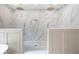 Luxurious shower with dual shower heads and marble tile at 113 Stargaze Rdg, Canton, GA 30114