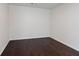 Empty room with dark hardwood floors at 2231 Bedell Dr, Conyers, GA 30094